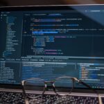 close up of laptop displaying debugging software