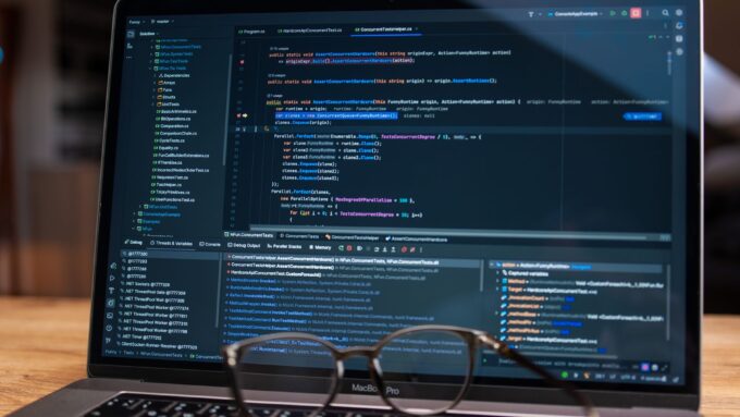 close up of laptop displaying debugging software